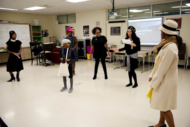 Students at Cowherd Middle School rehearse for their February 24 performance with Ms. Collette Taylor, drama teacher